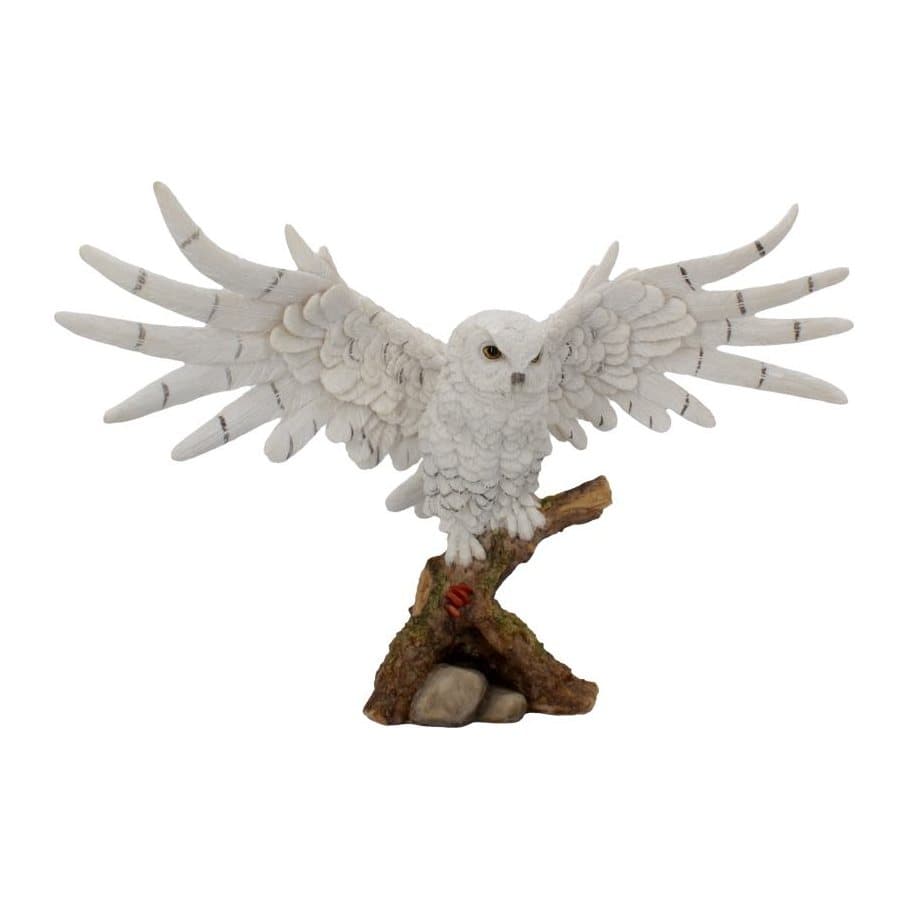 Snowy owl figure with wings spread wide and high