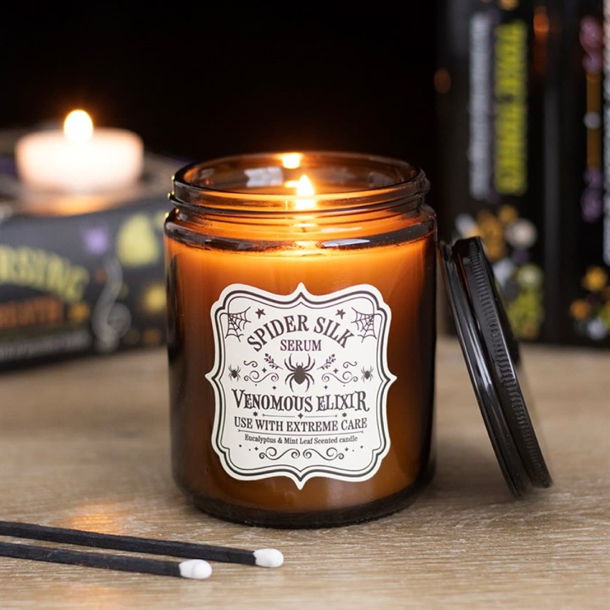 Eucalyptus and mint scented candle in an apothecary-style glass jar