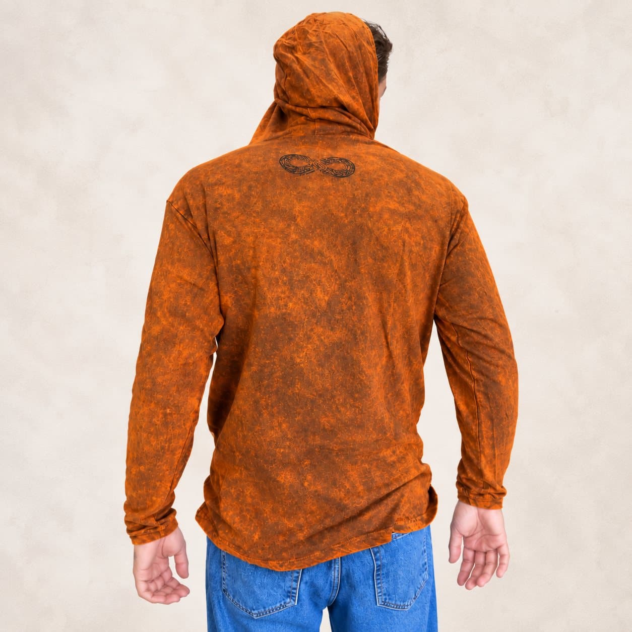 Burnt orange stone washed hoodie with black chest motif and kangaroo pocket