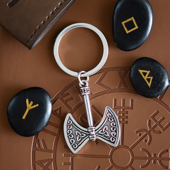 Alloy Axe of Valor keyring on a cardboard backing card