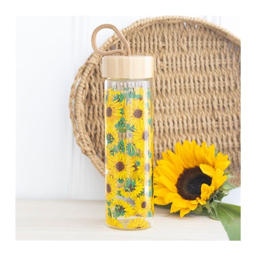 Glass water bottle with an all-over sunflower print and bamboo lid