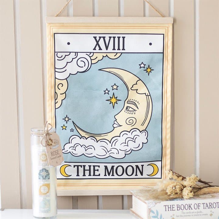 Fabric wall hanging showing The Moon tarot card design with a twine loop.
