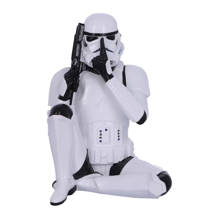 Stormtrooper figurine sitting with a finger to his helmet mouth