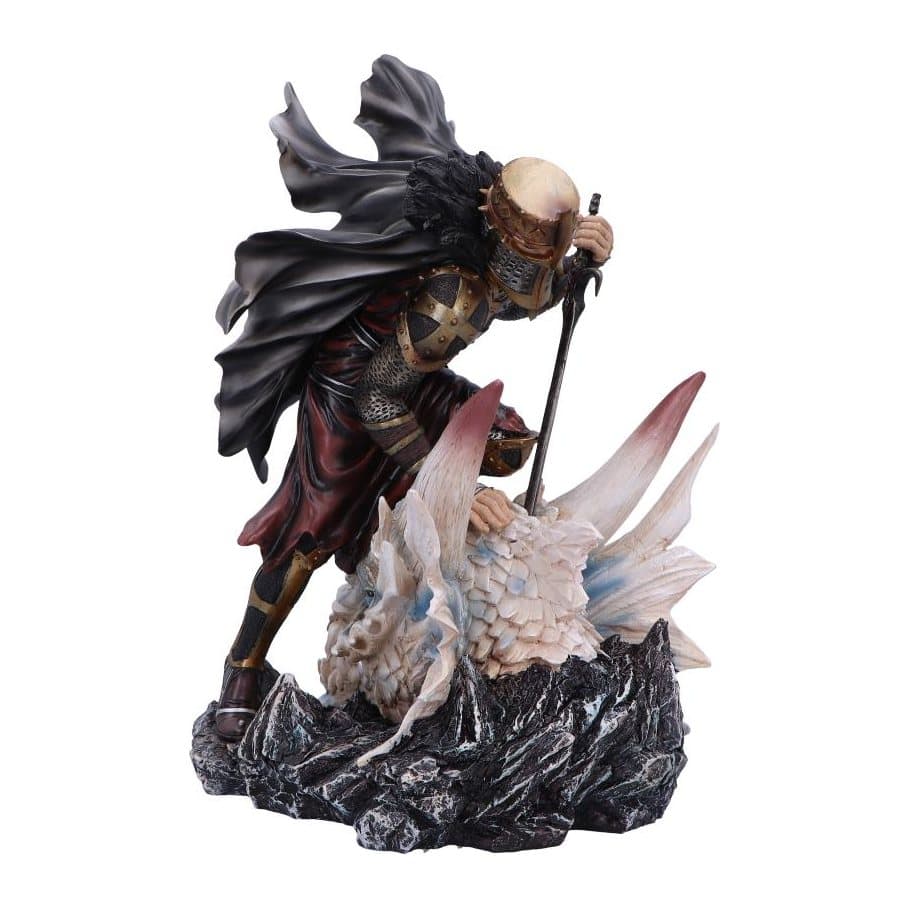 Resin figurine of a knight kneeling over a fallen dragon in gold and black