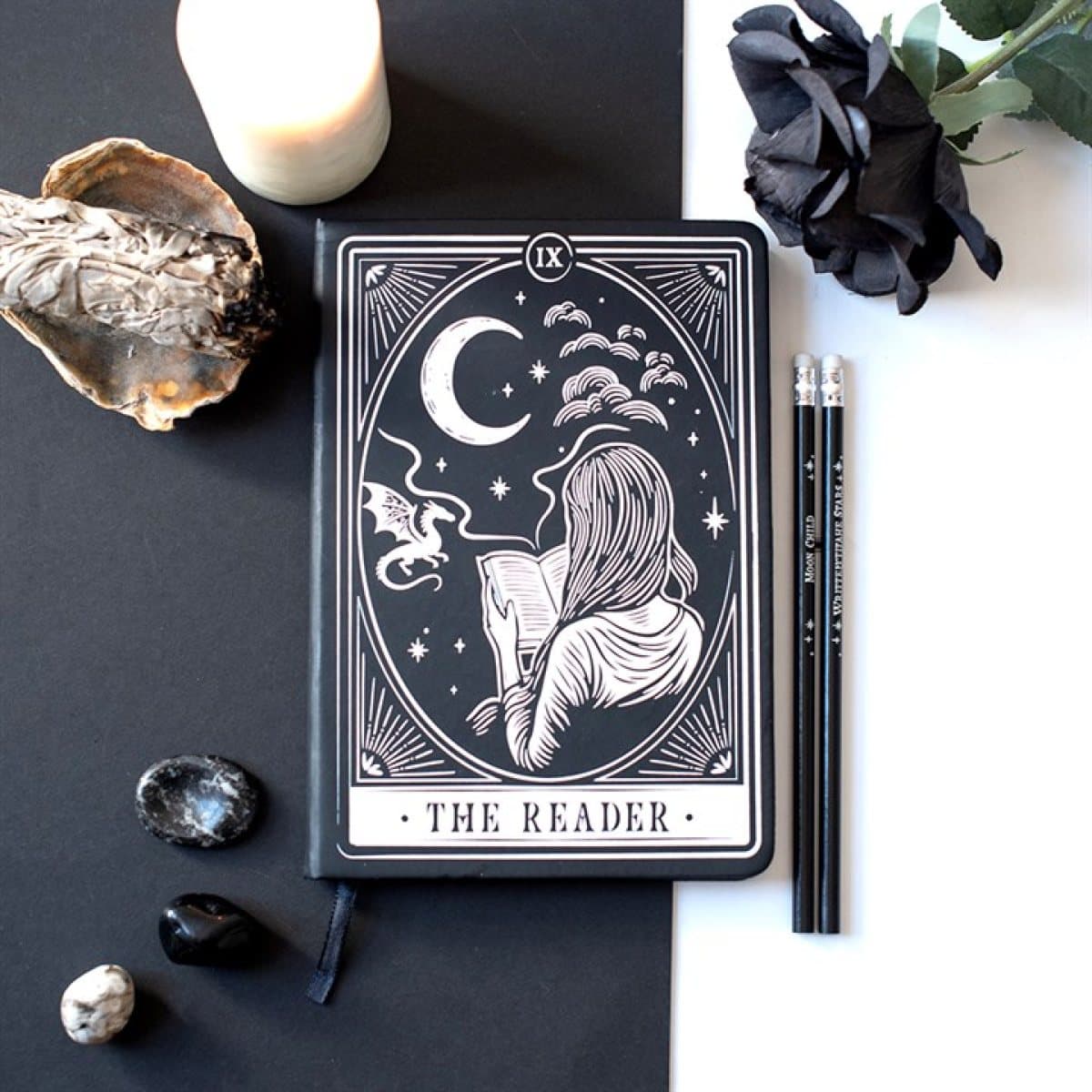 A5 notebook with tarot-style art of a reader and a dragon