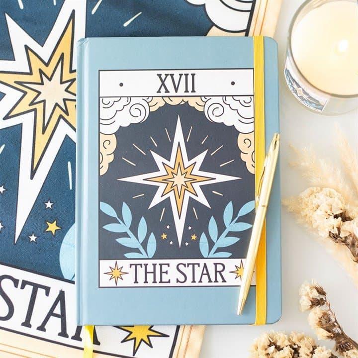 The Star vintage tarot card design on the cover of an A5 notebook