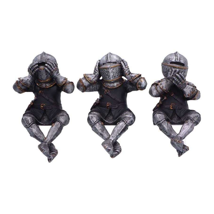 Three knight figurines sitting side by side in silver and gold armour
