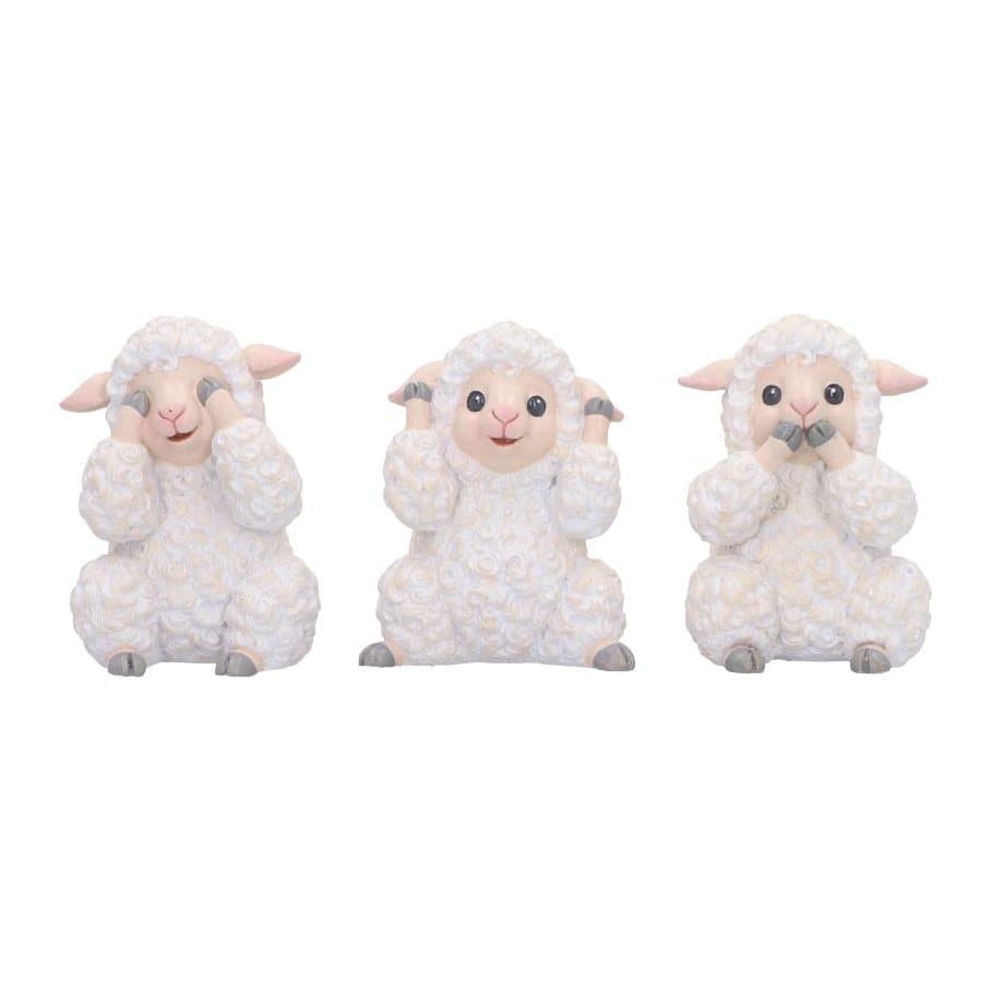 Three fluffy resin sheep figurines in see no, hear no and speak no evil poses