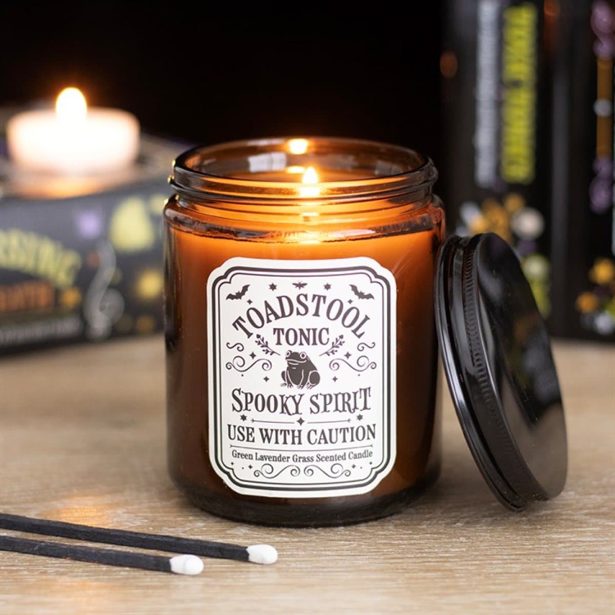 Toadstool Tonic lavender grass candle in an apothecary-style glass jar