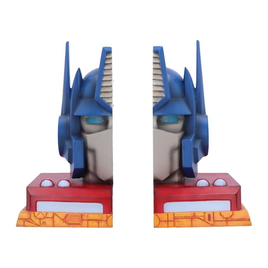 Optimus Prime bookends in Generation One form standing on Cybertronian paneling