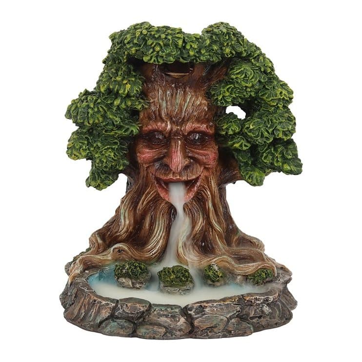 Tree Man backflow incense burner with a blue pond below