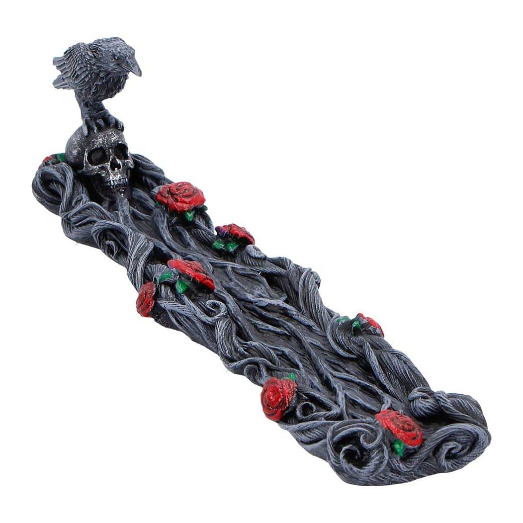Gothic raven incense burner with a raven perched on a skull and red roses