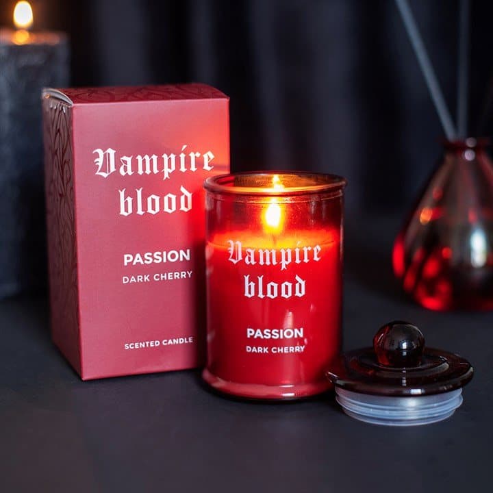 Dark cherry candle in a blood red apothecary style jar labelled Passion