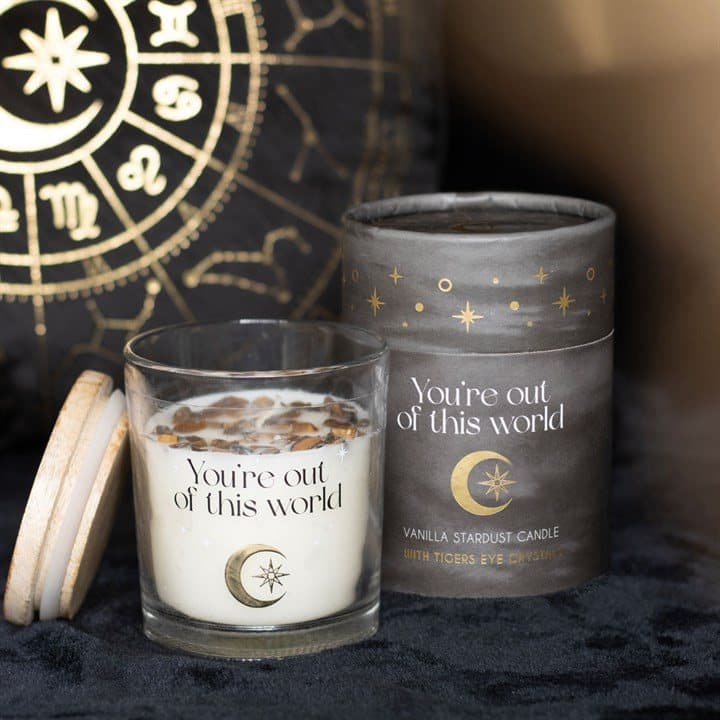 Vanilla Stardust candle in a glass holder with Tiger's Eye crystal chips