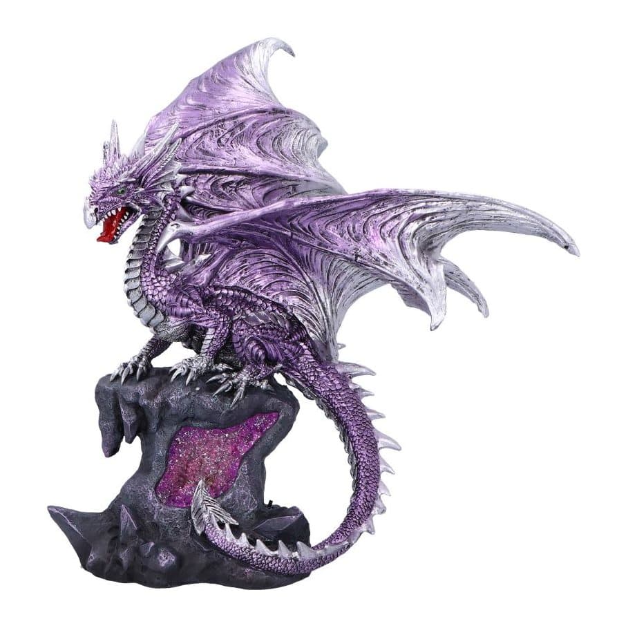 Purple dragon figurine with silver-accented wings on a rock base with crystal core