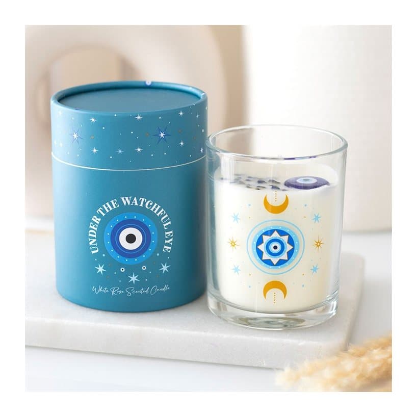 Candle jar with an all-seeing eye, moons and stars