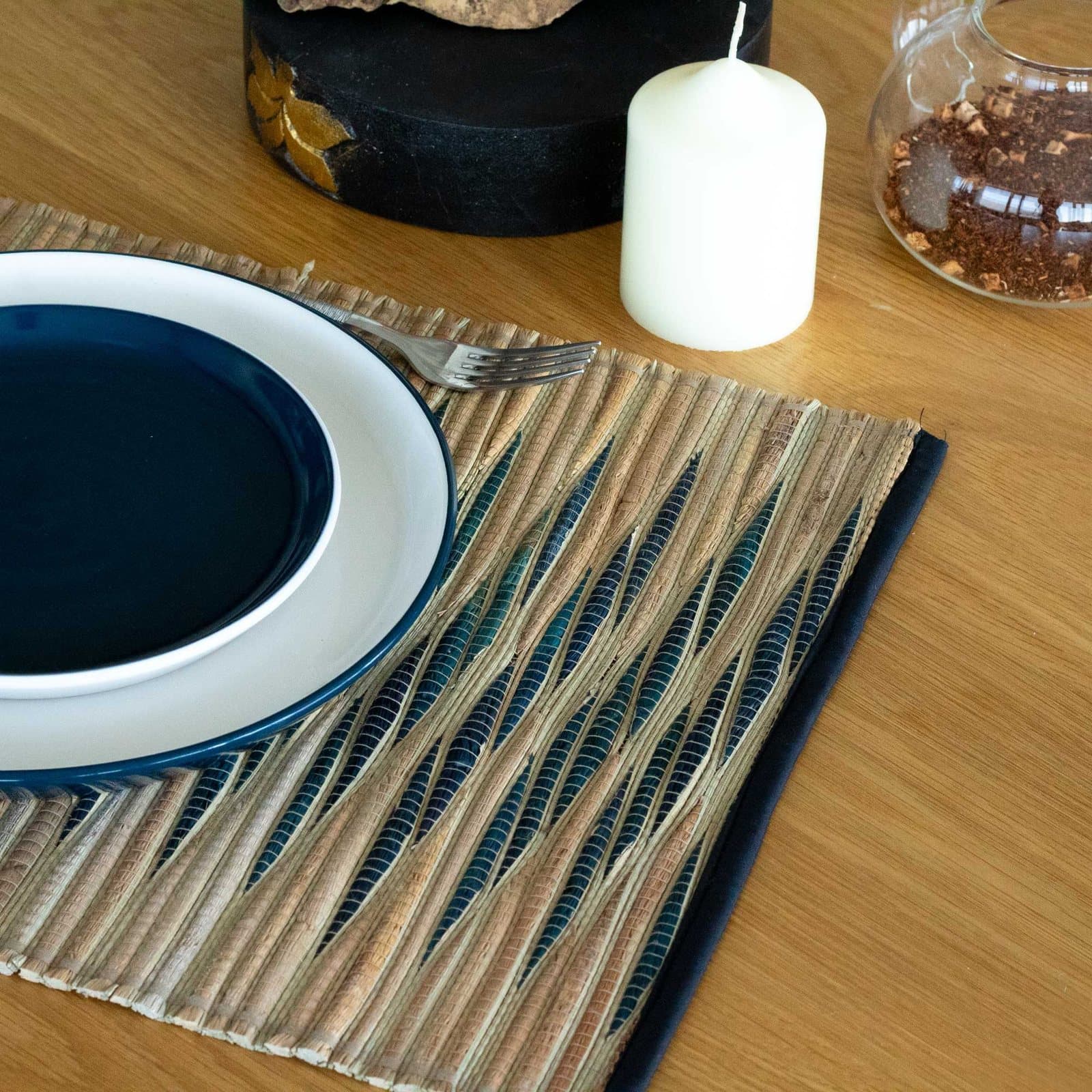 Water hyacinth placemat with a waves pattern in blue or black and white
