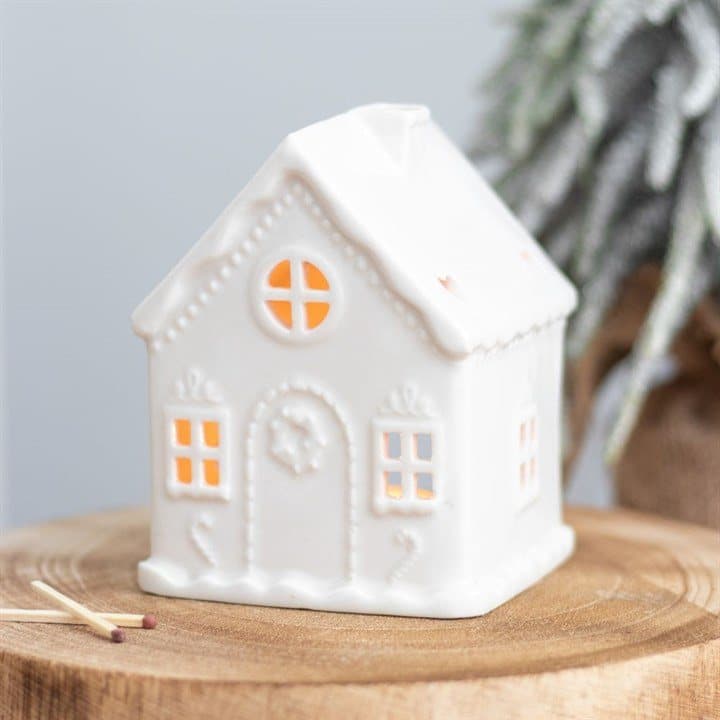 White gingerbread house tealight holder