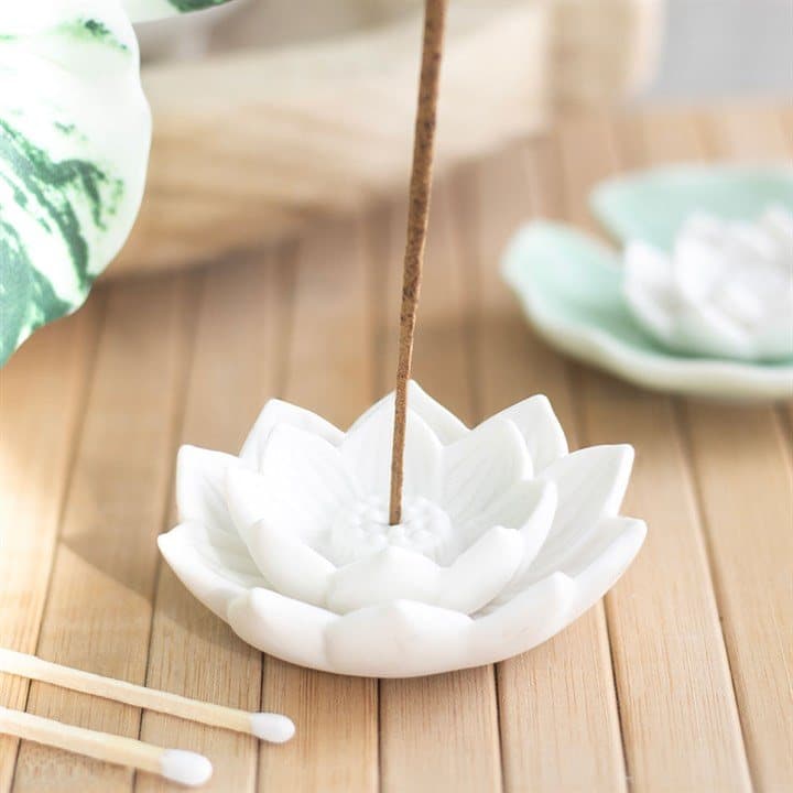 White ceramic lotus flower incense stick holder
