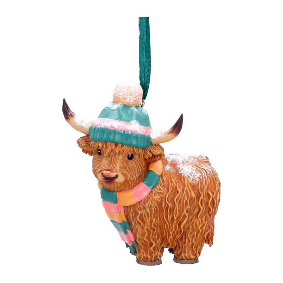 Resin Highland cow ornament in a colourful scarf and woolly hat with snow detailing