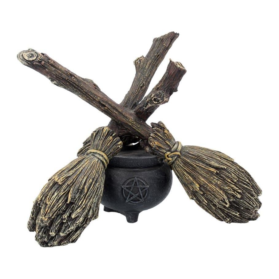 Three resin broomsticks lashed into a tripod on a pentagram cauldron