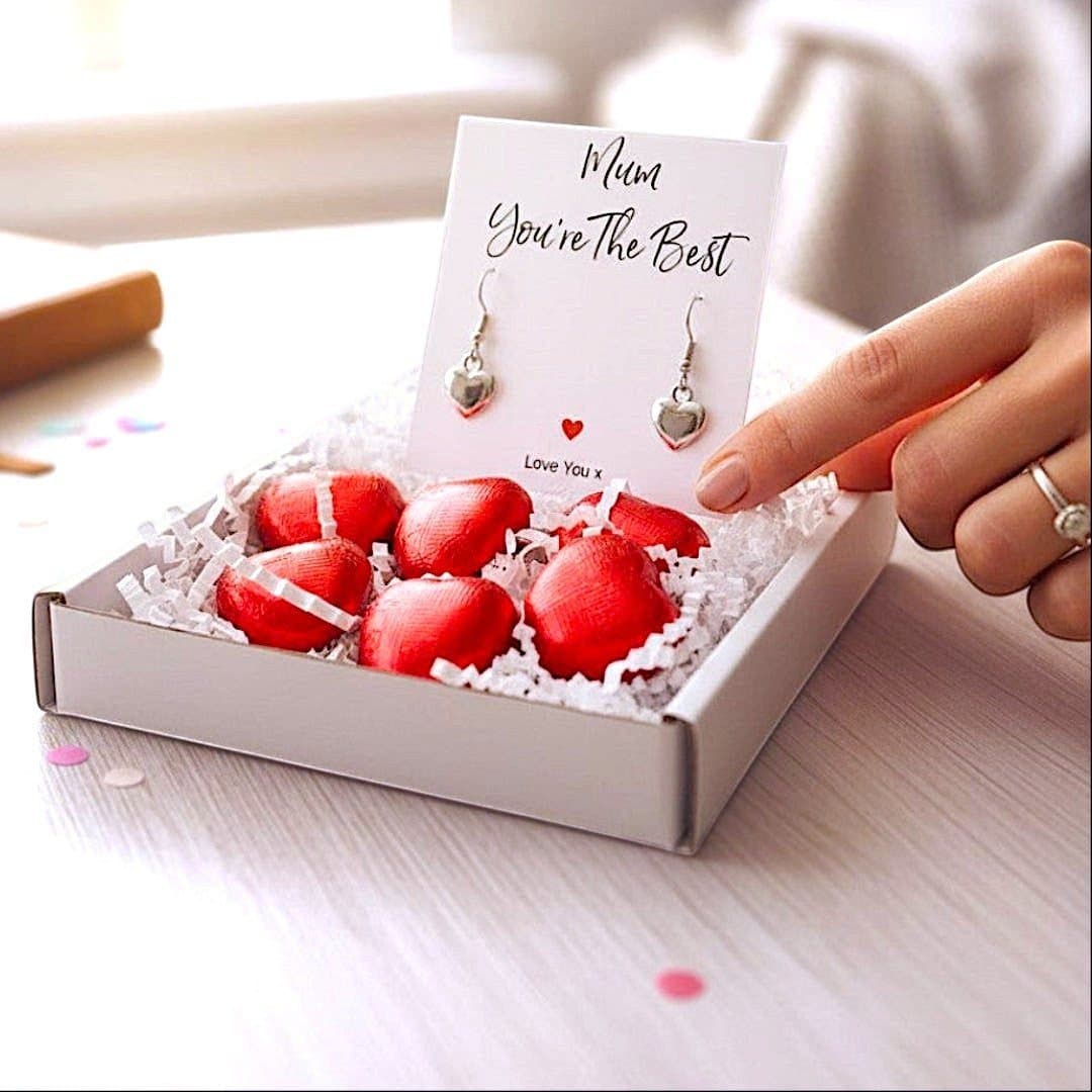 Silver plated puff heart earrings and a Mum You're the Best card in a mini gift hamper