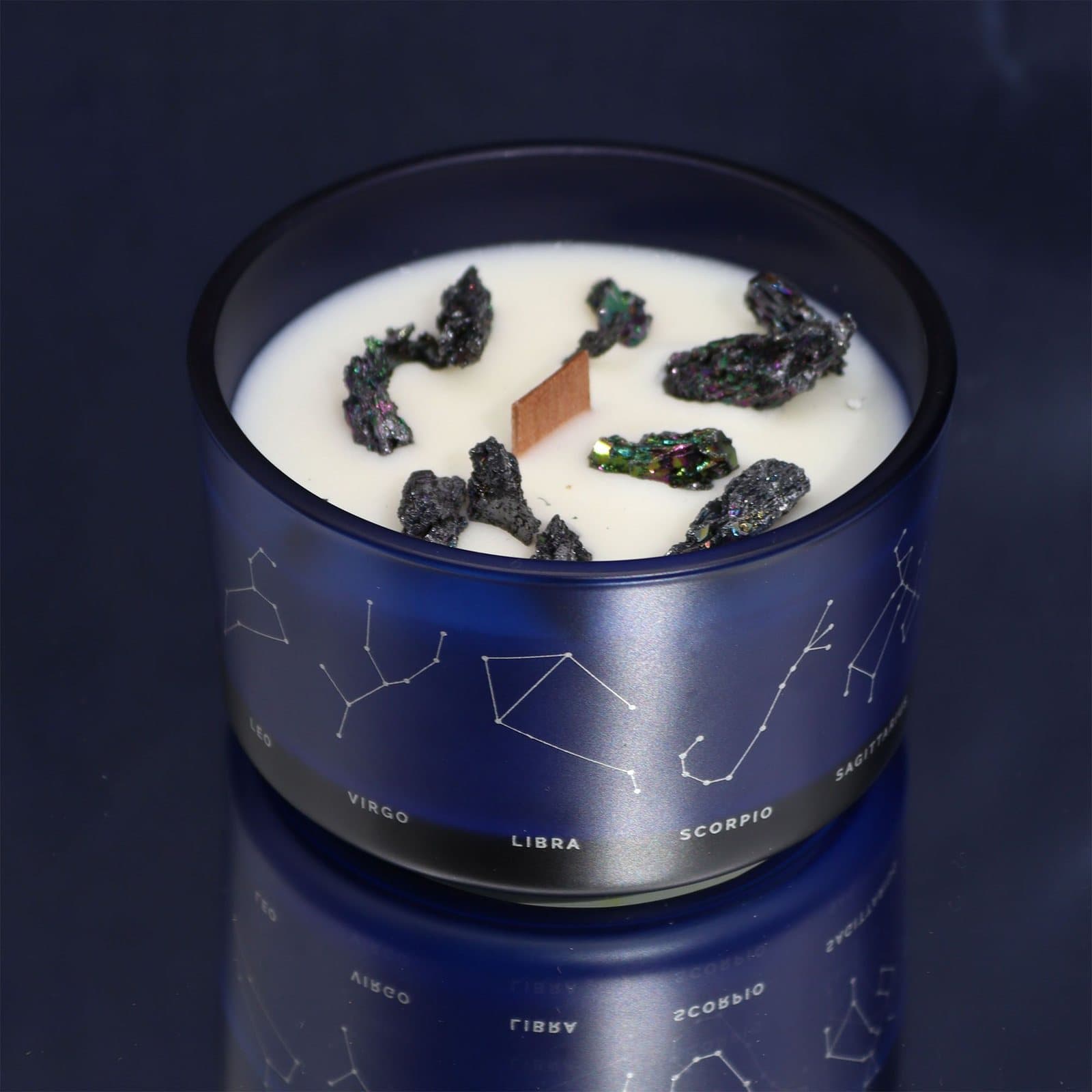 Zodiac crystal candle with a gemstone bracelet