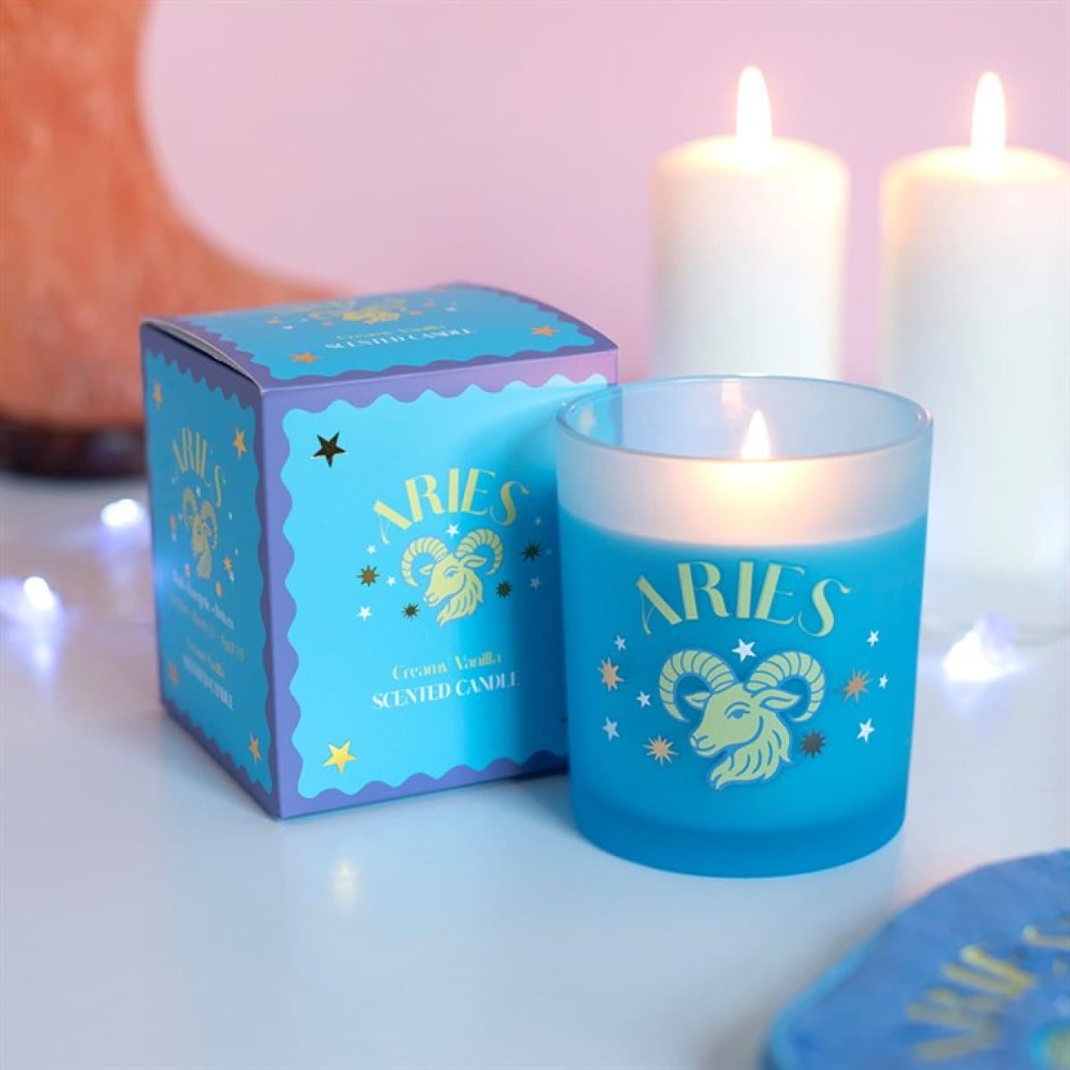 Aries zodiac candle with a colourful design