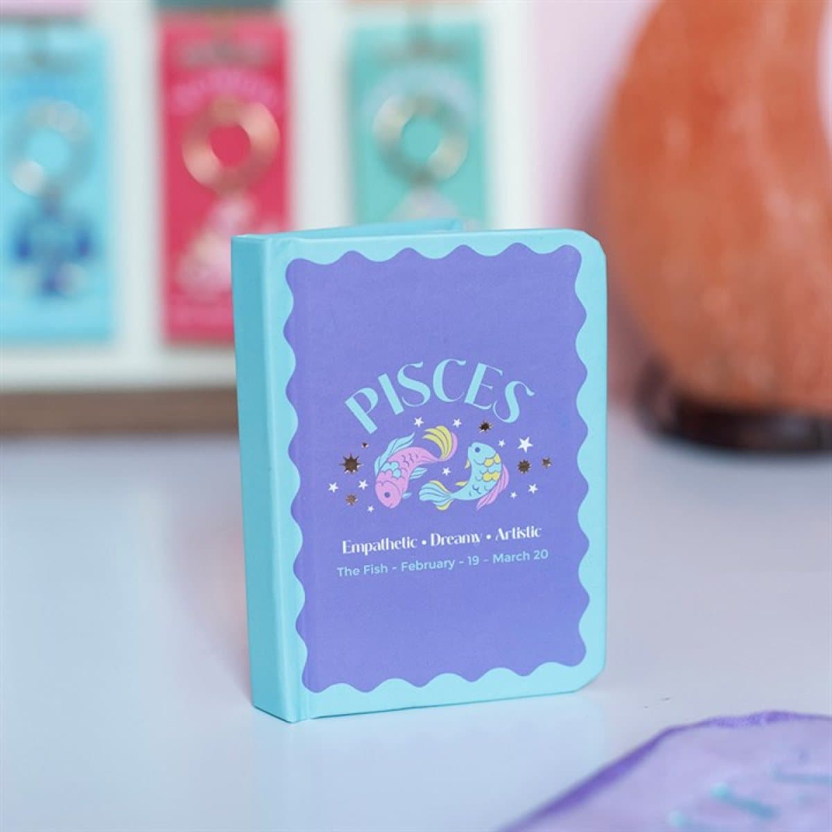 Pisces mini A7 notebook with colourful fish artwork